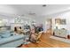 Spacious living room with hardwood floors, a fireplace, and many seating areas at 807 Craig St, New Smyrna Beach, FL 32168