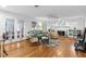 Cozy living room with hardwood floors, fireplace, and ample seating at 807 Craig St, New Smyrna Beach, FL 32168
