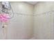 Renovated shower features updated tile and sleek fixtures at 807 Craig St, New Smyrna Beach, FL 32168