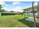 Spacious backyard with lush green grass, perfect for outdoor activities at 837 Acorn Ln, Port Orange, FL 32127