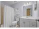 Clean and well-lit bathroom with a tub, shower, and a functional vanity at 837 Acorn Ln, Port Orange, FL 32127