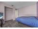 Inviting carpeted bedroom with a closet, offering comfort and tranquility at 837 Acorn Ln, Port Orange, FL 32127