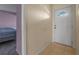 Clean foyer entrance with tiled flooring, leading to a bedroom and the main area at 837 Acorn Ln, Port Orange, FL 32127