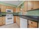 Well-lit kitchen featuring ample counter space and modern appliances at 837 Acorn Ln, Port Orange, FL 32127