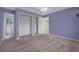 Spacious bedroom with ample closet space and an ensuite bathroom at 837 Acorn Ln, Port Orange, FL 32127
