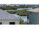 Picturesque water view surrounded by lush greenery, offering a serene and natural ambiance at 895 Catfish Ave, New Smyrna Beach, FL 32169