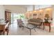 Spacious open living room with tile flooring and built-in display shelving at 904 Clubhouse Blvd, New Smyrna Beach, FL 32168