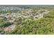 The property is located in a serene waterfront neighborhood with canals and lush greenery at 154 Godfrey Rd, Edgewater, FL 32141