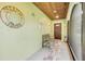 Inviting entrance with a wooden bench and coastal decor, creating a warm and welcoming atmosphere for guests at 154 Godfrey Rd, Edgewater, FL 32141