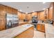Stylish kitchen with stainless steel appliances, ample wood cabinets, and plenty of counter space at 154 Godfrey Rd, Edgewater, FL 32141
