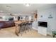 Open-concept living area with seamless flow between the living room, dining space, and kitchen at 154 Godfrey Rd, Edgewater, FL 32141
