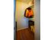 Walk-in closet features hardwood flooring and shelving for optimal storage solutions at 101 N Riverside Dr # 1090, New Smyrna Beach, FL 32168