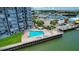 This waterfront condo features a lovely pool area and lots of patio seating at 101 N Riverside Dr # 1090, New Smyrna Beach, FL 32168
