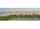 This aerial view shows the beach, the ocean, and a swimming pool with lounge chairs at 1051 Ocean Shore Blvd # 502, Ormond Beach, FL 32176