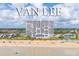 Van Lee condominium complex nestled on a sunny beach with inviting turquoise water and stunning oceanfront living at 1051 Ocean Shore Blvd # 502, Ormond Beach, FL 32176