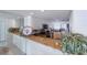 Modern kitchen with granite countertops, stainless steel appliances, and white cabinetry at 1051 Ocean Shore Blvd # 502, Ormond Beach, FL 32176
