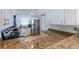 This spacious kitchen is complete with granite counters and stainless steel appliances at 1051 Ocean Shore Blvd # 502, Ormond Beach, FL 32176