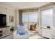 View of the living room that has comfortable furniture and a view of the ocean at 1051 Ocean Shore Blvd # 502, Ormond Beach, FL 32176