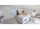 Spacious main bedroom with a mirrored wall and a private access to a balcony at 1051 Ocean Shore Blvd # 502, Ormond Beach, FL 32176