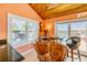 Boat-themed bar area with seating and outdoor pool views at 1219 Commodore Dr, New Smyrna Beach, FL 32168