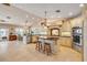 Gourmet kitchen featuring custom cabinetry, a wood island, and stainless steel appliances at 1219 Commodore Dr, New Smyrna Beach, FL 32168