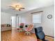The comfortable living room features a ceiling fan and natural light at 1331 Needle Palm Dr, Edgewater, FL 32132