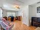 A large living room with natural light is an ideal workspace at 1331 Needle Palm Dr, Edgewater, FL 32132