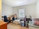 A cluttered storage room, offering a practical space to store items and belongings within the property at 1331 Needle Palm Dr, Edgewater, FL 32132