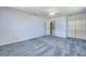 View of bedroom with neutral walls, carpet, and closets at 2416 Pine Tree Dr, Edgewater, FL 32141