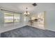 A cozy dining area flows into an efficient kitchen at 2416 Pine Tree Dr, Edgewater, FL 32141