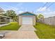 A detached garage and screened in patio at 2416 Pine Tree Dr, Edgewater, FL 32141