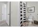 Bathroom featuring a tub/shower with stylish striped curtain, toilet and woven basket at 2667 Neverland Dr, New Smyrna Beach, FL 32168