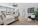 Bright bedroom featuring a ceiling fan, complementary decor and plenty of natural light from the window at 2667 Neverland Dr, New Smyrna Beach, FL 32168