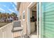 Balcony with seating and a view into the kitchen at 2898 Ocean Shore Blvd # 5020, Ormond Beach, FL 32176