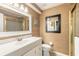 Bright bathroom with a classic design featuring a framed mirror, vanity and shower at 2898 Ocean Shore Blvd # 5020, Ormond Beach, FL 32176