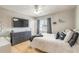 Bright bedroom with a view, featuring a large dresser and stylish decor at 2898 Ocean Shore Blvd # 5020, Ormond Beach, FL 32176