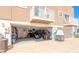 Attached garage with motorcycle and storage, showcasing functionality and convenience at 2898 Ocean Shore Blvd # 5020, Ormond Beach, FL 32176