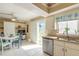 Sunny breakfast area, with a built in desk, leading to a balcony with ocean views at 2898 Ocean Shore Blvd # 5020, Ormond Beach, FL 32176