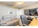 Functional office space with sofa and large screen television, ready for work or leisure at 2898 Ocean Shore Blvd # 5020, Ormond Beach, FL 32176