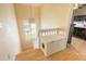 Bright staircase landing with a window and a custom built-in storage box at 2898 Ocean Shore Blvd # 5020, Ormond Beach, FL 32176