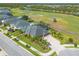 Lovely home featuring a well-manicured lawn, complemented by an extended driveway, with golf course views, for luxurious living at 2939 Bella Flore Ter, New Smyrna Beach, FL 32168