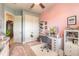 Large vanity in bedroom offers lots of natural light, closet, and easy access to other rooms at 2939 Bella Flore Ter, New Smyrna Beach, FL 32168