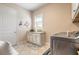Laundry room with sink, storage, and modern washer and dryer at 2939 Bella Flore Ter, New Smyrna Beach, FL 32168