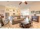 Open living space showcasing the kitchen, dining area, and a comfortable living room setup at 2939 Bella Flore Ter, New Smyrna Beach, FL 32168