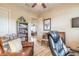 Office with leather furniture, built-in bookshelf, and access to other rooms in the house at 2939 Bella Flore Ter, New Smyrna Beach, FL 32168