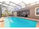 Expansive pool area with outdoor seating, dining, and lounging spaces for relaxation at 2939 Bella Flore Ter, New Smyrna Beach, FL 32168