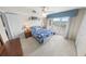Bedroom with a balcony, a ceiling fan, and carpeted floors at 2967 S Atlantic Ave # 508, Daytona Beach, FL 32118