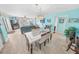Comfortable dining room with tile floors, and an open layout with access to the living room at 2967 S Atlantic Ave # 508, Daytona Beach, FL 32118
