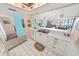 Functional kitchen featuring a breakfast bar offering views into the living area at 2967 S Atlantic Ave # 508, Daytona Beach, FL 32118
