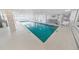 Clean indoor pool with bright lighting and ocean views through large windows at 2967 S Atlantic Ave # 508, Daytona Beach, FL 32118